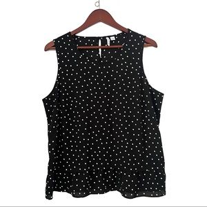 Elle black and white polka dot ruffle bottom top size L